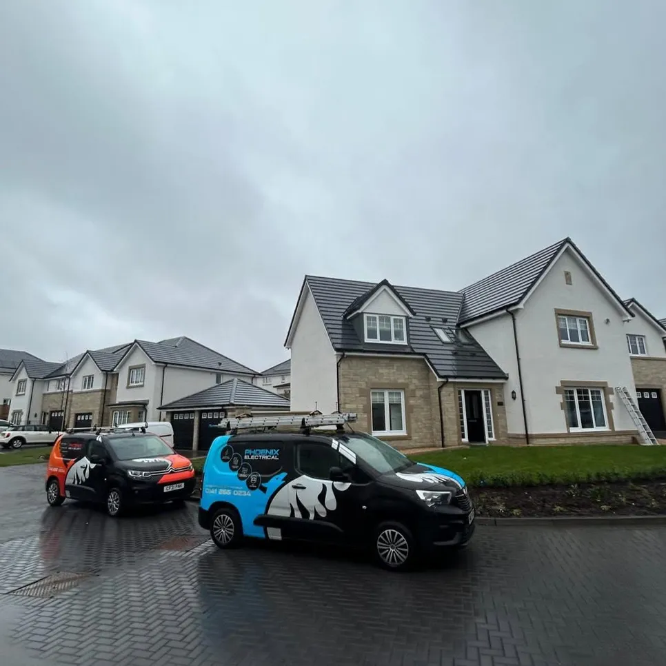 Phoenix Fire and Security Scotland and Phoenix Electrical - Vans on site in Glasgow